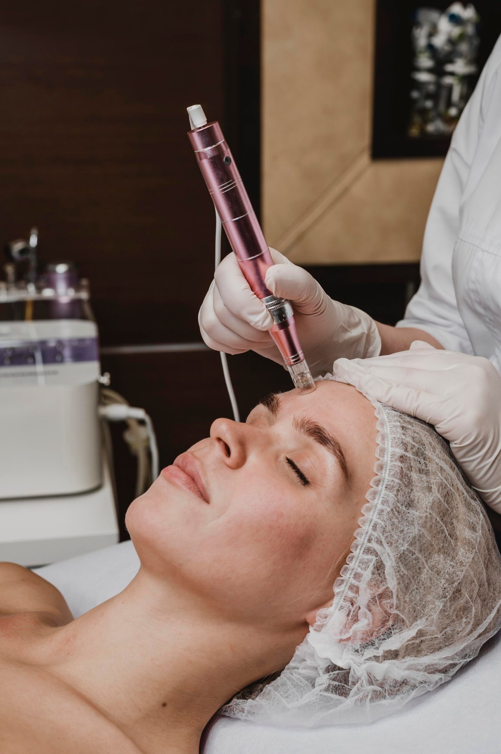 woman wellness center having cosmetic treatment scaled