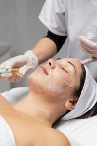 woman having facial treatment scaled